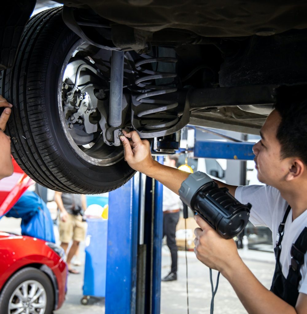 two-mechanic-was-checking-the-car-suspension--q45aq93j1d6t1a49rd1o76mpwjk1ap2ve9mkvll91c